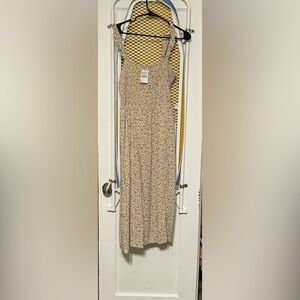 Taupe/black print dress with small leg split